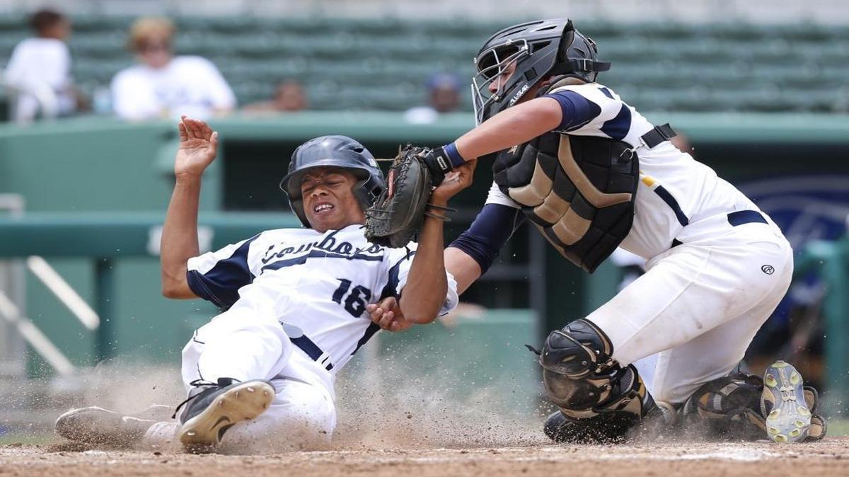 Belen's catcher Andrew Hernandez tags out Gaither's Jordan Williams in the fourth inning during game between Belen Jesuit and Gaither Cowboys of Tampa in Class 7A baseball state semifinal in Fort Myers on Thurs., May 19, 2016.