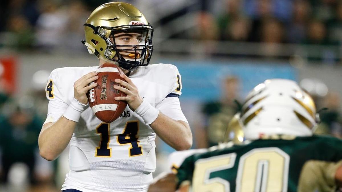 St. Thomas Aquinas quarterback Jake Allen (14) sets up to pass in the second quarter against Viera in the Class 7A championship at the Citrus Bowl in Orlando on Friday, December 11, 2015.