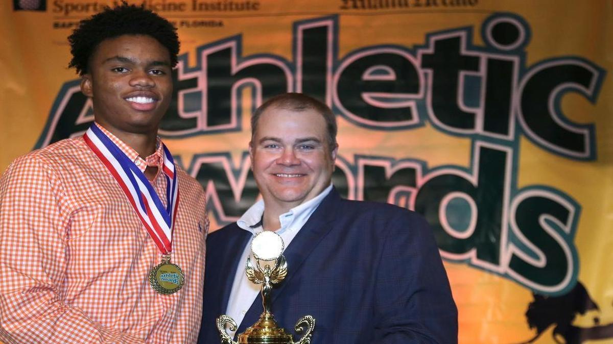 St. Thomas Aquinas’ Dominic Thieman, left, wins 2015-2016 Class 9A-6A Male Athlete of the Year. The Miami Herald's All-Broward Athletic Awards banquet was held on Tues., May 24, 2016 inside the Signature Grand Ballroom in Fort Lauderdale, Florida.