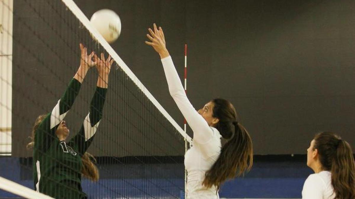 Isabella Lamus (Right) goes for a block on Priscilla Hernandezâ€™s (Left) kill during the Gulliver Prep Raiders game against the Westminster Christian Warriors at Gulliver Preparatory School Wednesday, Nov. 1, 2017.