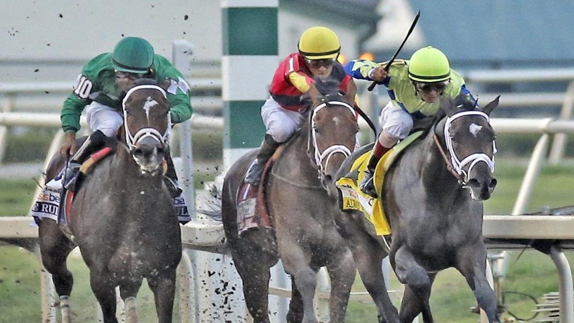 Always Dreaming and jockey John R. Velazquez, far right, surge to the lead down the stretch to capture the 66th running of the Florida Derby at Gulfstream Park on Sunday. With the victory, the Todd Pletcher-trained colt qualified for the Kentucky Derby on May 6 at Churchill Downs.