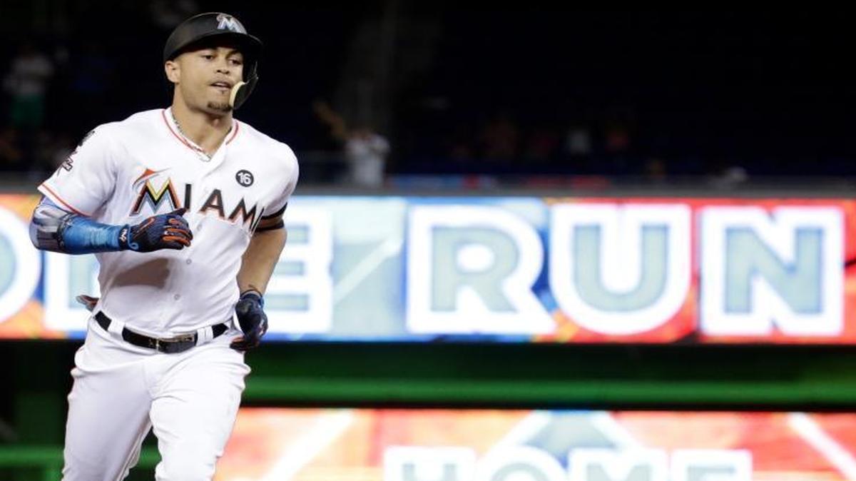 Miami Marlins' Giancarlo Stanton runs the bases after hitting a three-run home run during the fourth inning of a baseball game against the New York Mets, Monday, Sept. 18, 2017, in Miami.