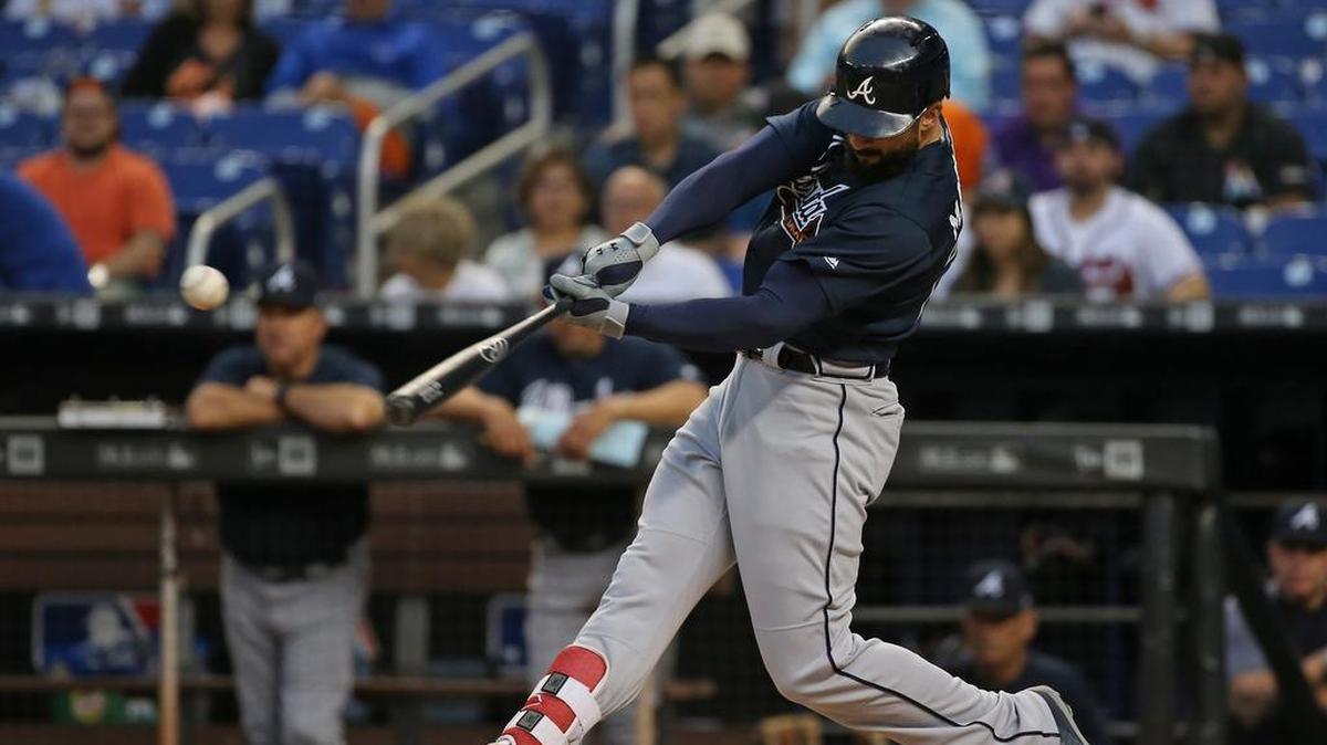 Atlanta Braves right fielder Nick Markakis hits a single during the second inning of a Major League Baseball game Miami Marlins against Miami Marlins at Marlins Park on Thursday, May 10, 2018.