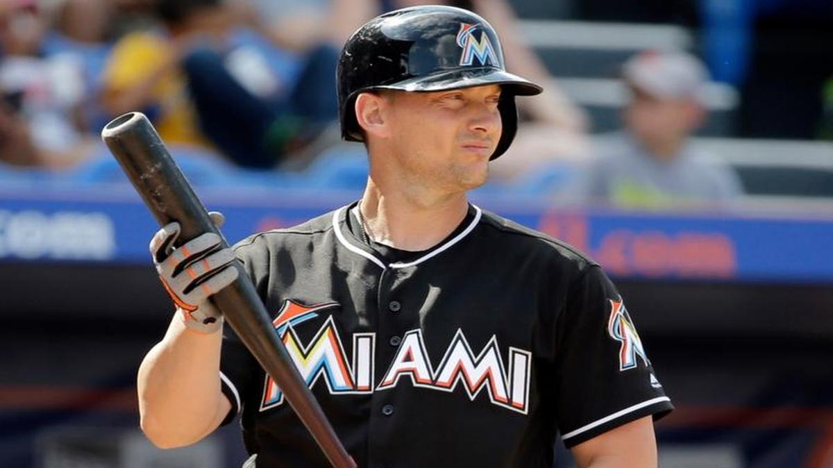 Miami Marlins’ Chris Johnson bats during the fifth inning of an exhibition spring training baseball game against the New York Mets Friday, March 4, 2016, in Port St. Lucie, Fla.
