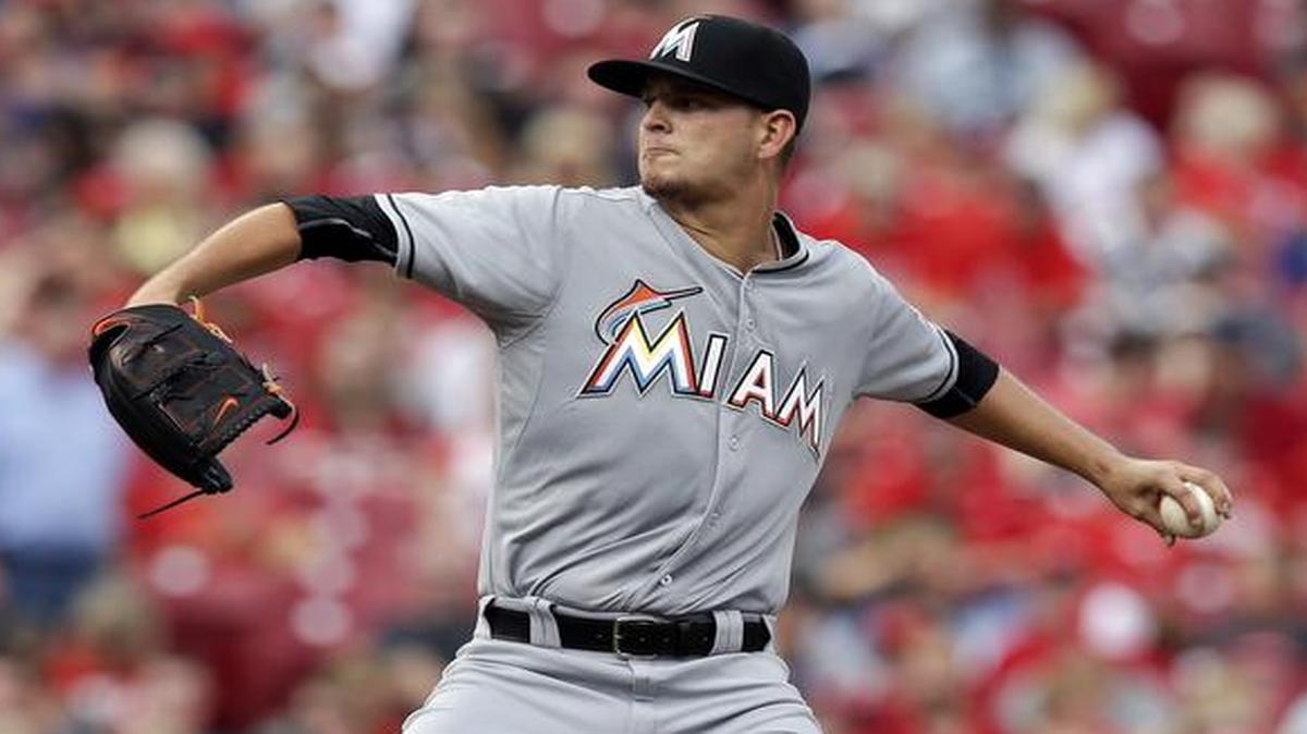 
Miami Marlins starting pitcher Justin Nicolino throws in the second inning of a baseball game against the Cincinnati Reds, Saturday, June 20, 2015, in Cincinnati. 
