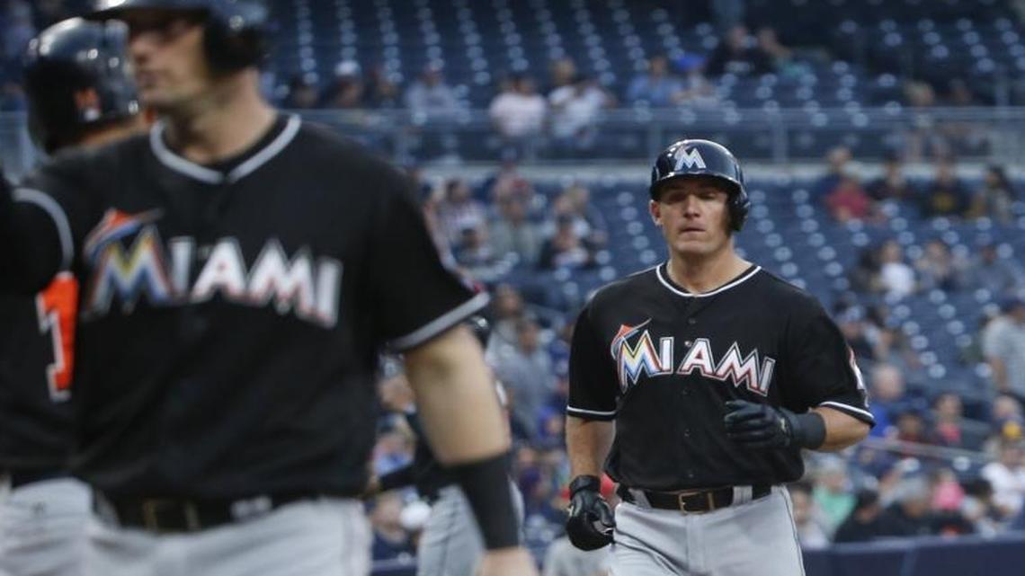 Miami Marlins' Chris Johnson jogs home after hitting a grand slam against the San Diego Padres during the first inning of a baseball game Tues., June 14, 2016, in San Diego.