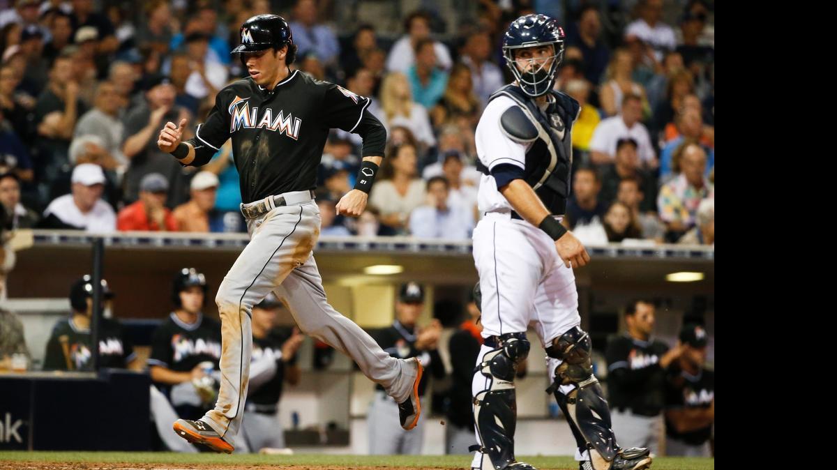 
Miami Marlins' Christian Yelich scores in the Marlins' four run sixth inning against the San Diego Padres in a baseball game Thursday, July 23, 2015, in San Diego. Yelich has hit .382 with a .484 on-base percentage since June 27. 
