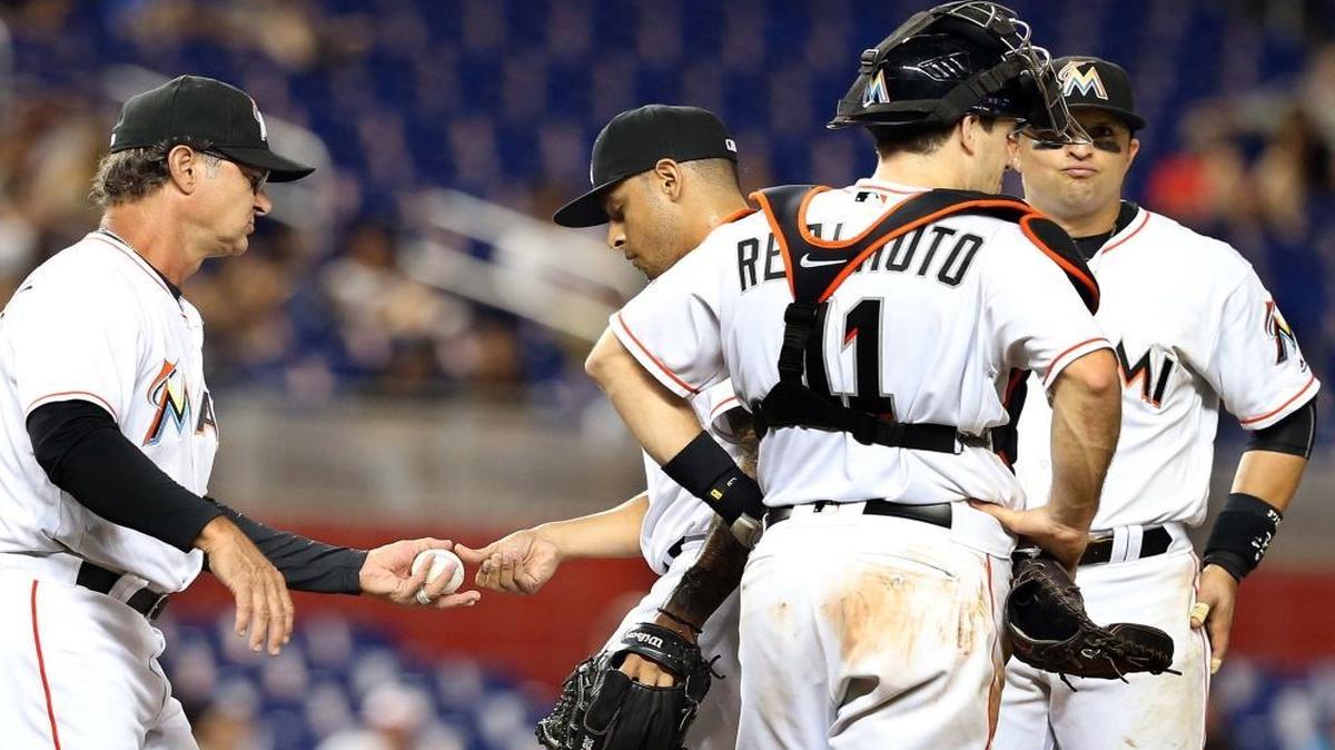 Miami Marlins' manager Dan Mattingly removes pitcher A.J. Ramos after he allowed three runs in the ninth inning of the Miami Marlins and Philadelphia Phillies game at Marlins Park in Little Havana in Miami on Mon., July 25, 2016.