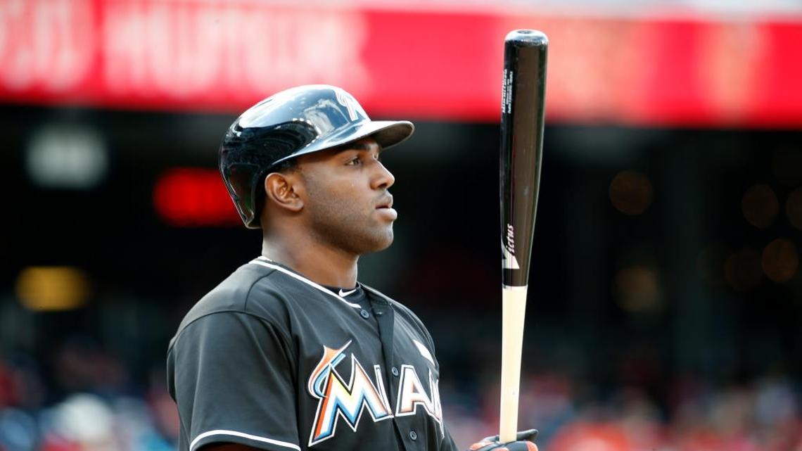 Miami Marlins center fielder Marcell Ozuna (13) prepares to bat during a baseball game against the Washington Nationals at Nationals Park, Sunday, May 15, 2016, in Washington. Marlins won 5-1.
