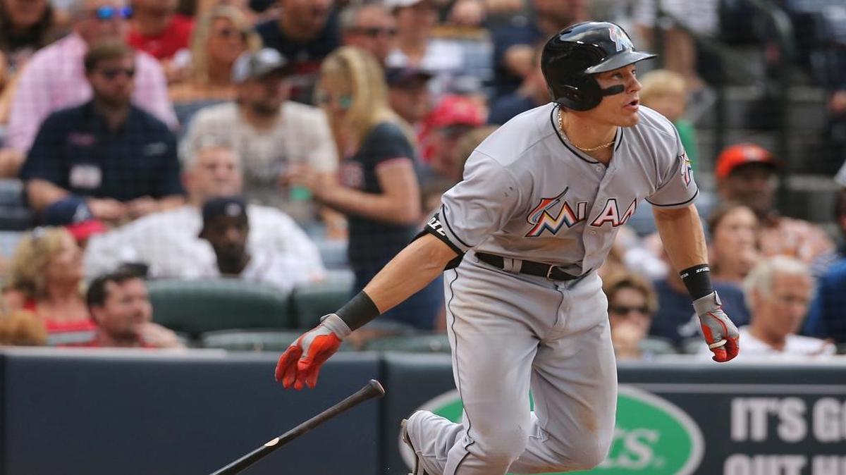 Miami Marlins' Derek Dietrich doubles in the top of the seventh inning to score two runs for a 6-1 lead over the Atlanta Braves on Sunday, May 29, 2016, at Turner Field in Atlanta.