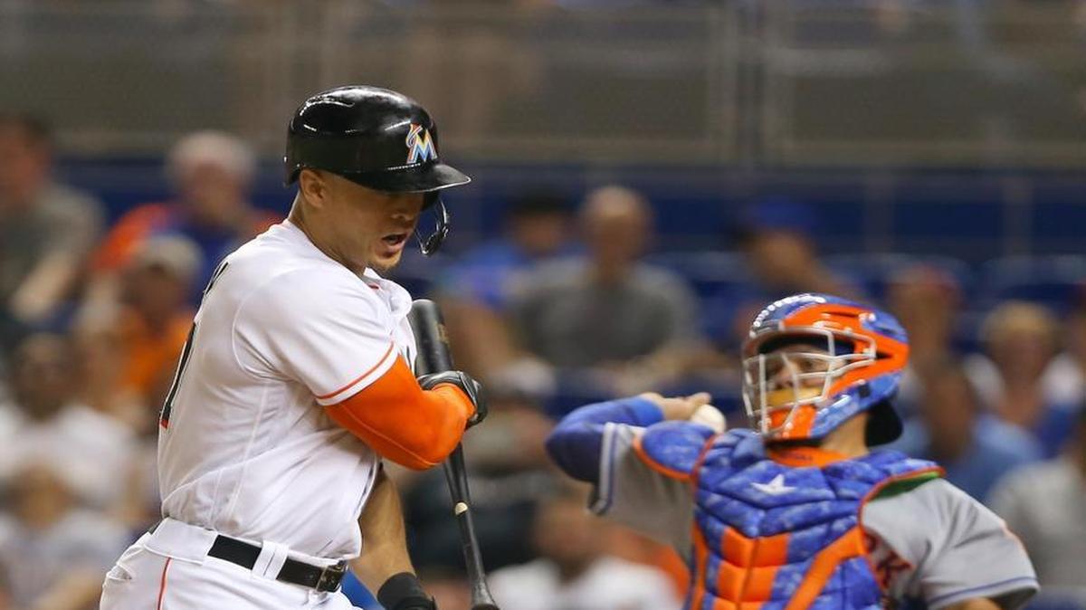 Miami Marlins right fielder Giancarlo Stanton reacts after striking out swinging during the fourth inning of the game against the New York Mets on June 3, 2016 at Marlins Park in Miami.