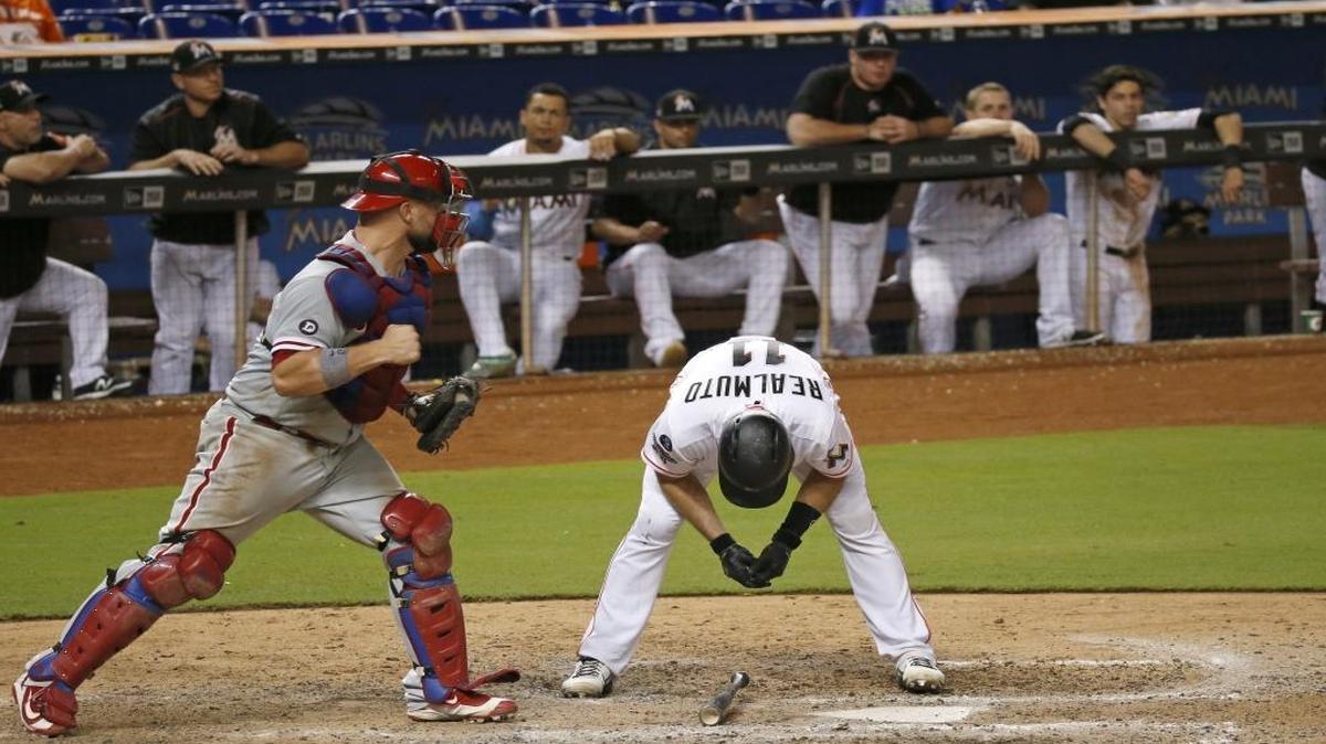 Miami Marlins catcher J.T. Realmuto reacts after striking out to end the during the baseball game against the Philadelphia Phillies at Marlins Park on Thurs., Aug. 31, 2017 in Miami. Phillies won 3-2.