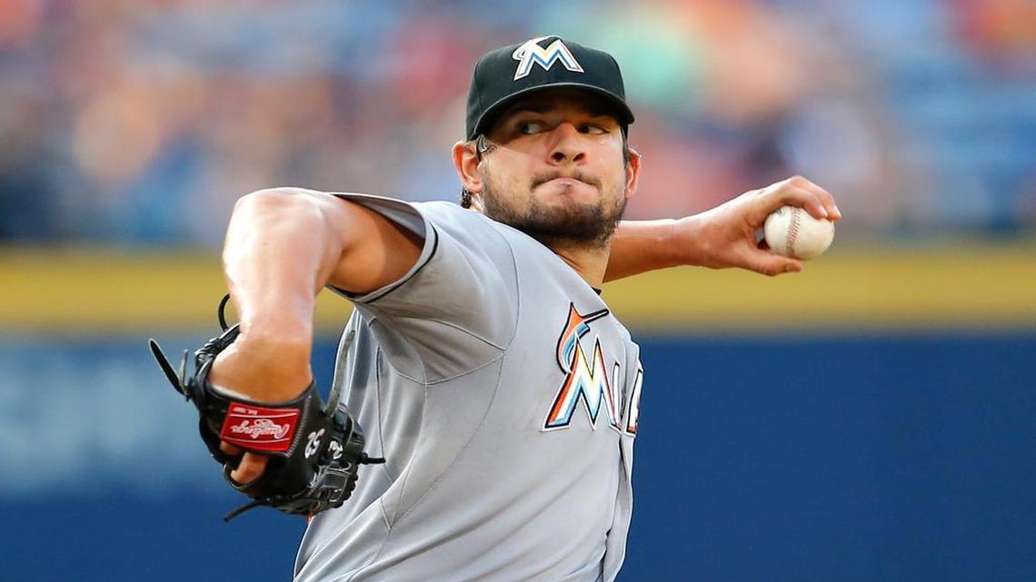 
Miami Marlins starting pitcher Brad Hand (52) delivers in the sixth inning of a baseball game against the Atlanta Braves, Sunday, Aug. 9, 2015, in Atlanta. 
