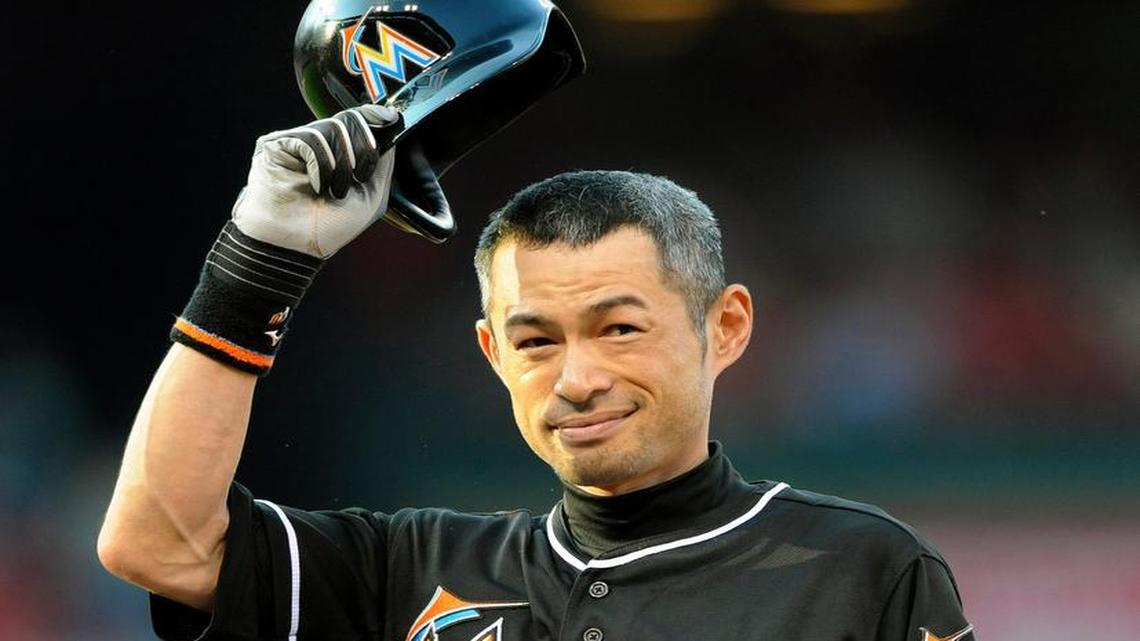 
Miami Marlins' Ichiro Suzuki (51) tips his hat to the fans after his single against the St. Louis Cardinals in the first inning of a baseball game, Saturday, Aug. 15, 2015, at Busch Stadium in St. Louis.
