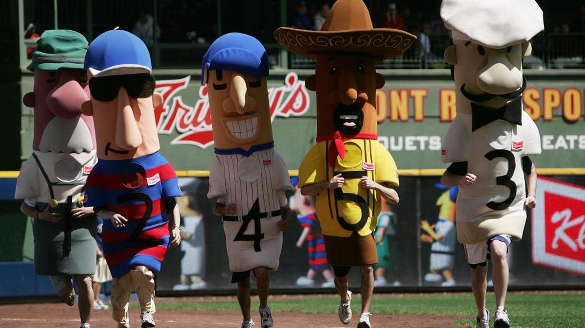 The Racing Sausages run before the seventh inning of a game between the Milwaukee Brewers and the St. Louis Cardinals May 2, 2007 at Miller Park in Milwaukee, Wisconsin.