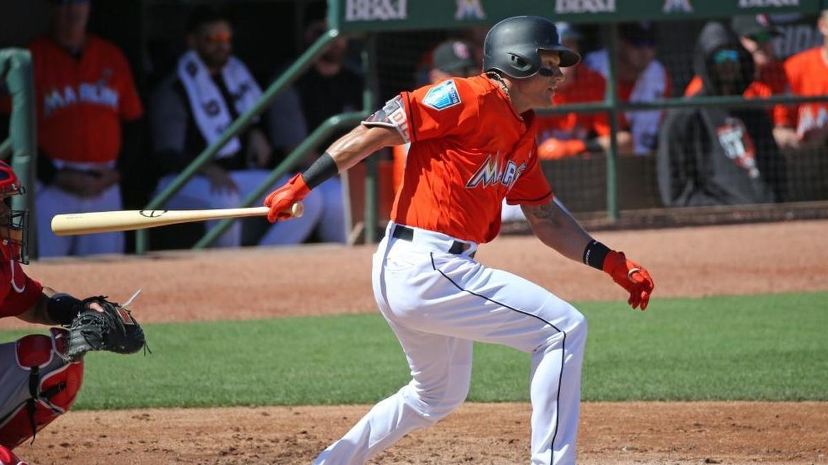 Miami Marlins utility player Derek Dietrich is slated to start in left field this season, but will likely see playing time on both sides of the outfield.