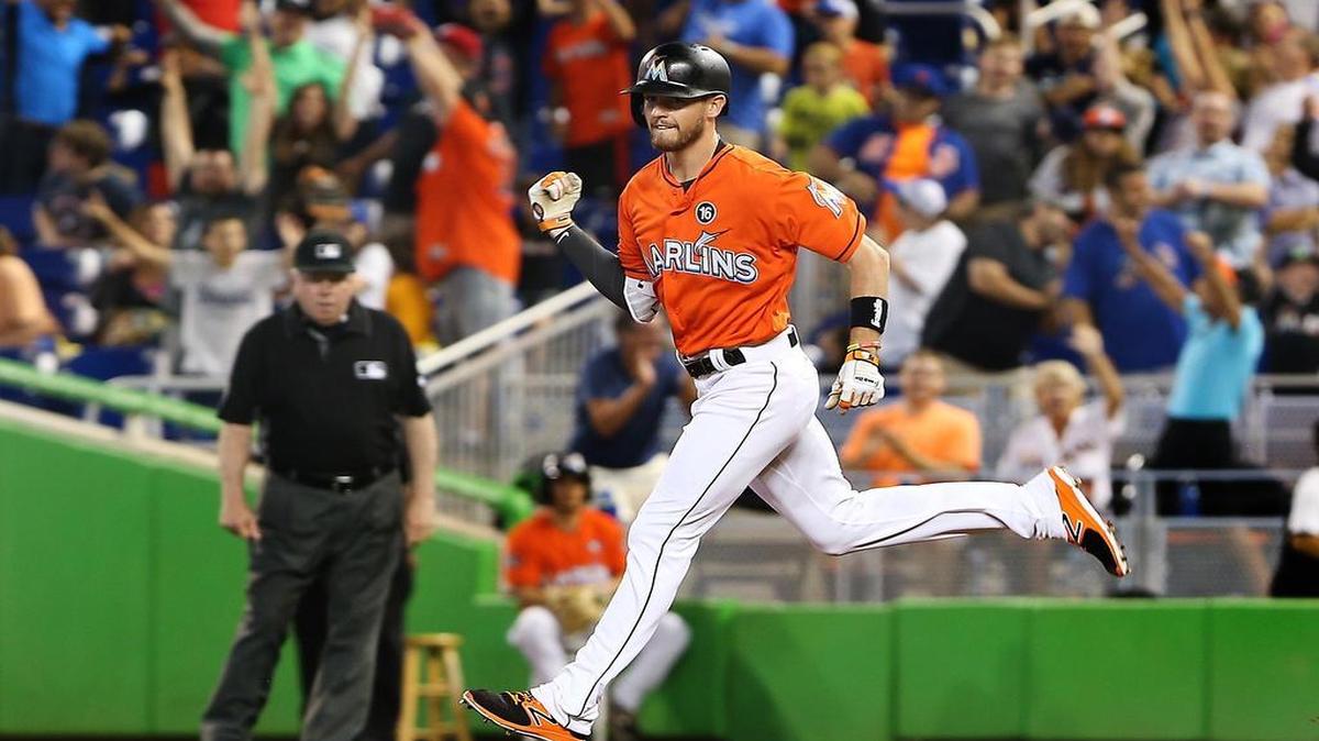 The Marlin's J.T. Riddle (39) celebrates his walk-off homerun as the Miami Marlins beat the New York Mets at Marlins Park Stadium in Little Havana on Sunday, April 16, 2017.