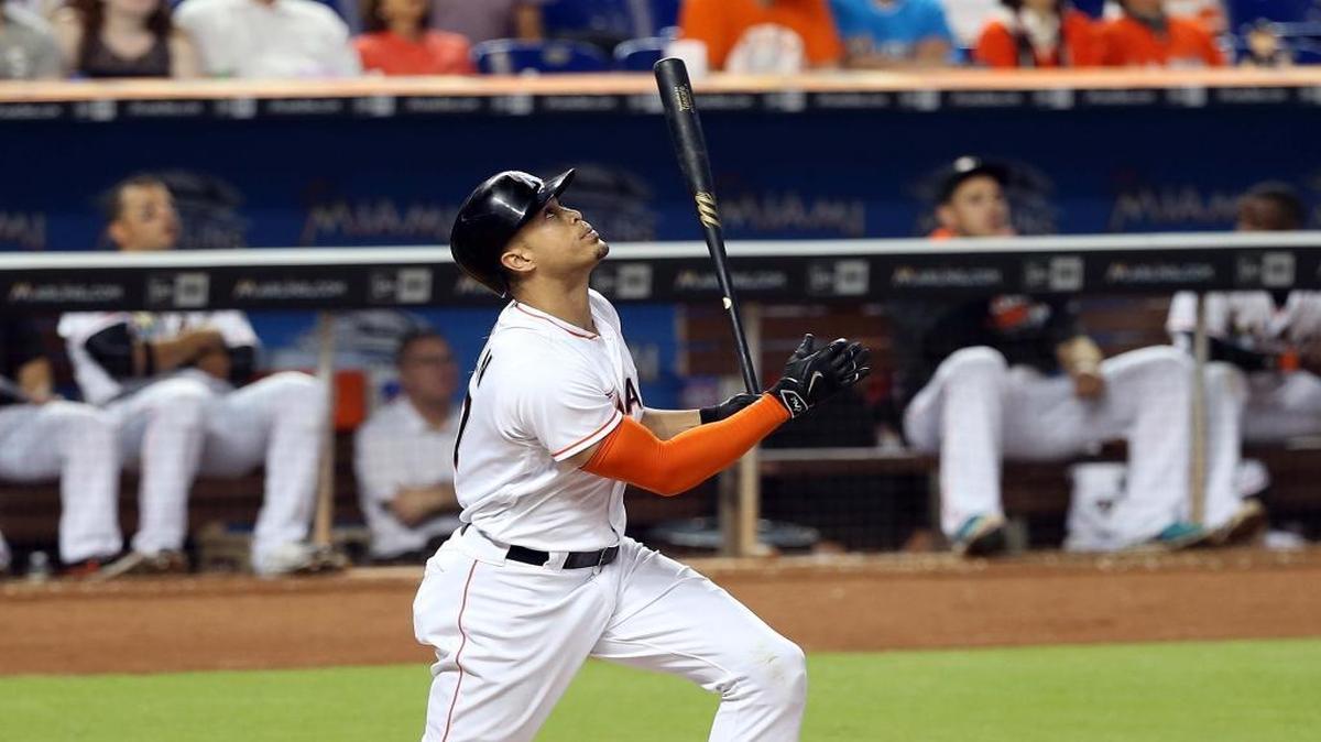 Giancarlo Stanton, of the Miami Marlins reaches to second on error by Tampa's Steve Pearce (2B), in the fourth inning of the Miami Marlins vs Tampa Bay Rays, game at Marlins Park in Little Havana in Miami on Tuesday, May 24, 2016.