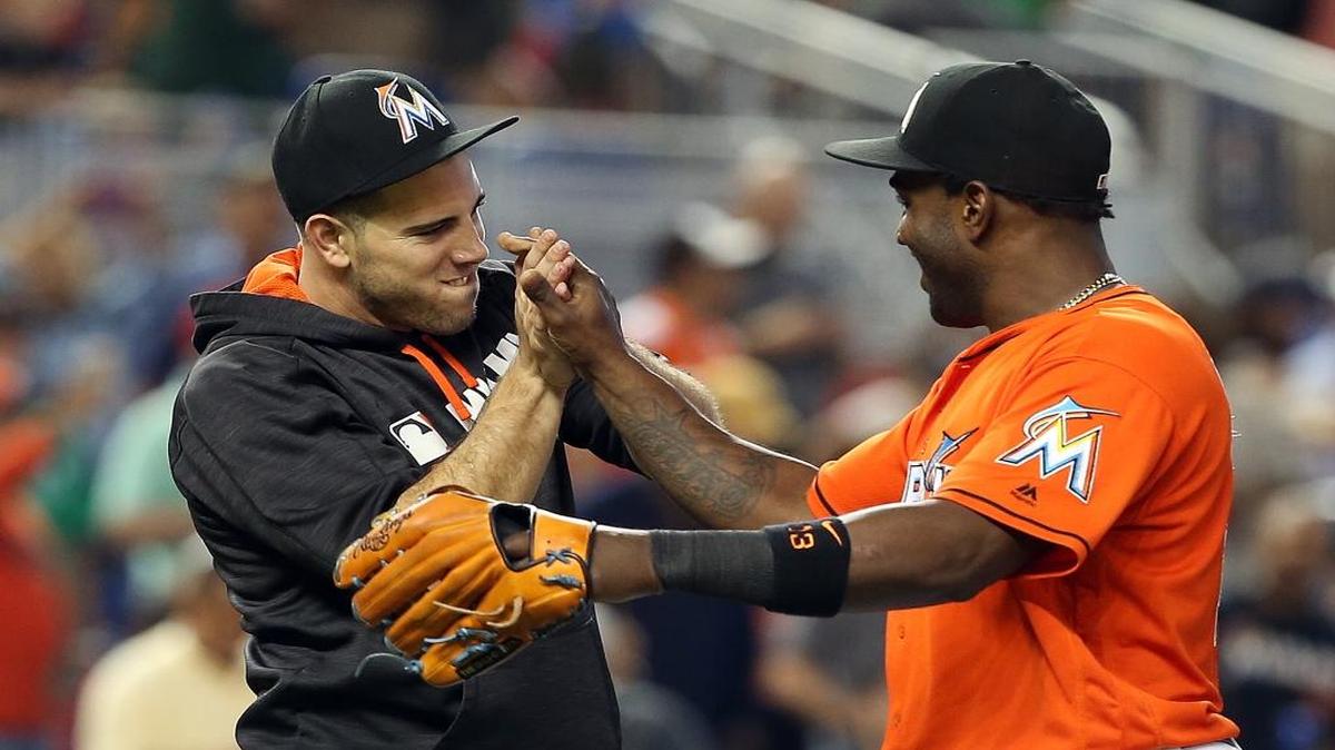 Miami Marlins' center fielder Marcell Ozuna, right, greets pitcher Jose Fernandez as they celebrate the Miami Marlins 1-0 victory against the New York Mets Sunday, June 5, 2016, at Marlins Park in Little Havana in Miami.