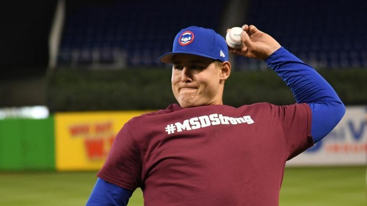 Anthony Rizzo, No. 44 of the Chicago Cubs, wears an MSDStrong shirt during warmups in honor of Stoneman Douglas High School before Opening Day against the Miami Marlins at Marlins Park on March 29, 2018 in Miami.