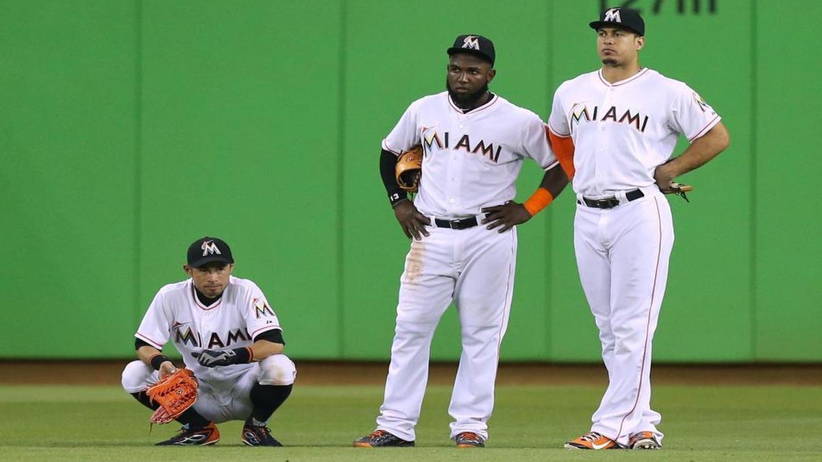 
From left, Miami Marlins outfielders Ichiro Suzuki, Marcell Ozuna and Giancarlo Stanton look on during the eighth inning against the Baltimore Orioles on Friday, May 22, 2015 at Marlins Park in Miami.
