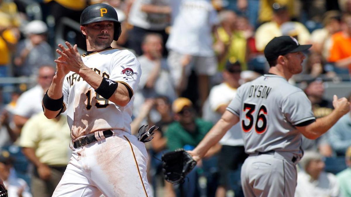 
Chris Stewart #19 of the Pittsburgh Pirates celebrates after scoring on a RBI single in the seventh inning during the game against the Miami Marlins at PNC Park on May 27, 2015 in Pittsburgh, Pennsylvania.
