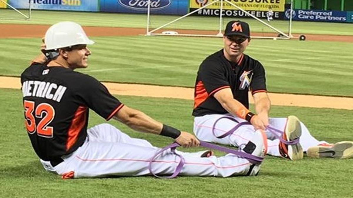 Derek Dietrich’s teammates presented him with a customized white hard hat - the type construction workers use - with his name and jersey number and the Marlins logo on the front.
