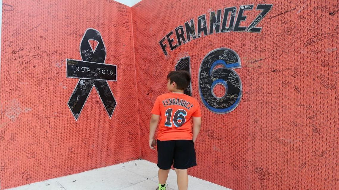 Lucas Arriaza,10, looks at the Jose Fernandez tribute wall before the start of the Miami Marlins’ home opener against the Atlanta Braves at Marlins Park on Tuesday, April 11, 2017.