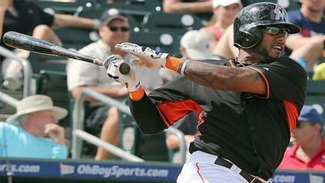 
The Marlins’ Jordany Valdespin singles against the Washington Nationals in a spring training game at Roger Dean Stadium in Jupiter, Fla., on Tuesday, March 10, 2015.
