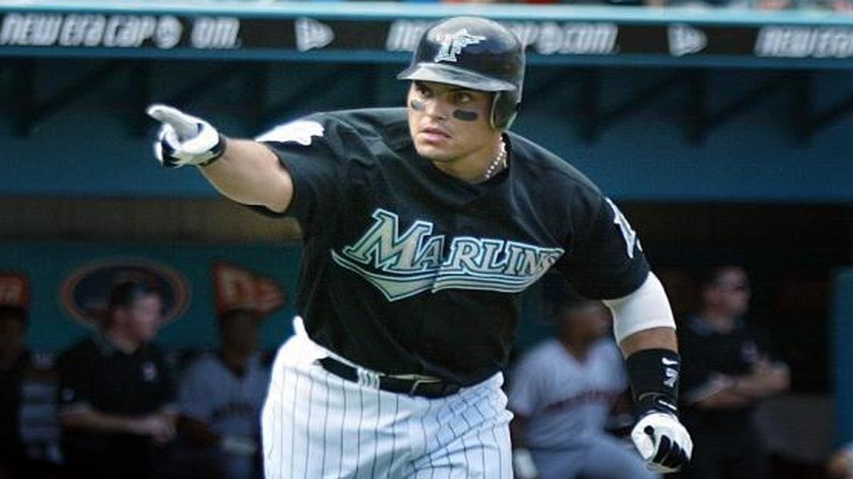 Ivan Rodriguez points to Marlins dugout after hitting his two-run home run in Game 3 of the National League Division Series against the San Francisco Giants on Oct. 3, 2003.