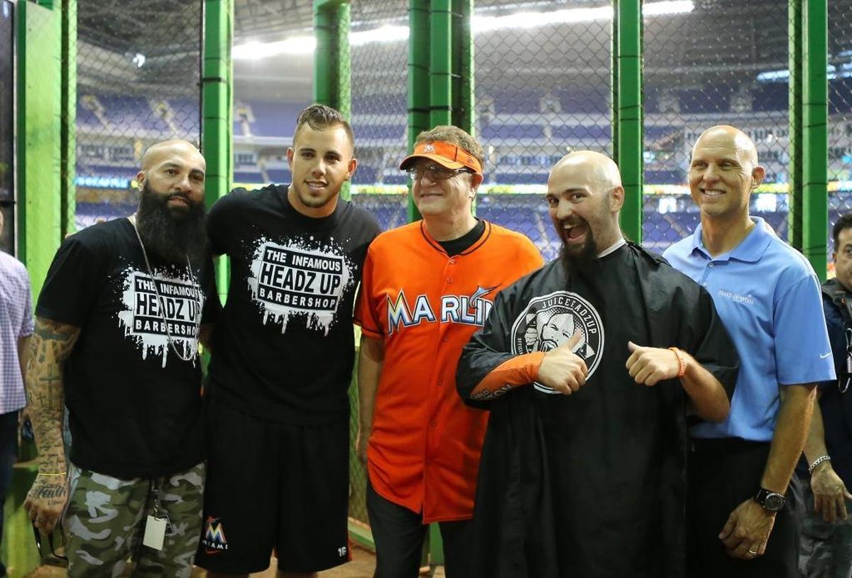 From left to right, Official barber of the Marlins Hugo ''Juice'' Tandron, Jose Fernandez, pitcher of the Miami Marlins, Laurence ''Marlins Man'' Leavy, Superfan Andres Salgado "The Jose Guy" , and Executive Vice-President of Brand Advancement and Chapter Operations, Richard Kelly, pose for the media after the hair cut before game against the San Francisco Giants on Wed., July 1, 2015, at Marlins Park in Miami. Marlins superfan Andres Salgado, who has spent 13-plus months growing his hair in honor of Fernandez's return from Tommy John surgery. The event will occur on the field at Marlins Park.