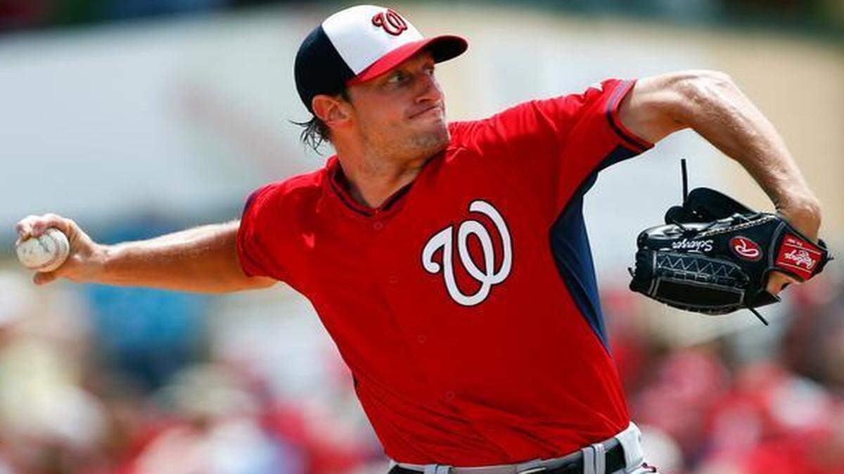 
Washington Nationals starting pitcher Max Scherzer works in the first inning of an exhibition spring training baseball game against the St. Louis Cardinals, Wednesday, March 25, 2015, in Jupiter, Fla. 
