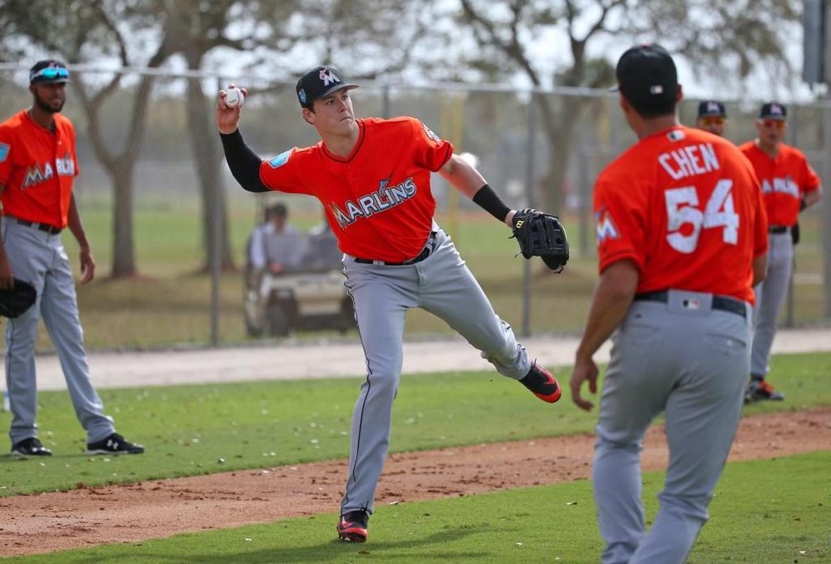 Miami Marlins infielder Brian Anderson throws to first base during the spring training baseball workouts at Roger Dean Stadium on Tues., Feb. 20, 2018 in Jupiter, FL.