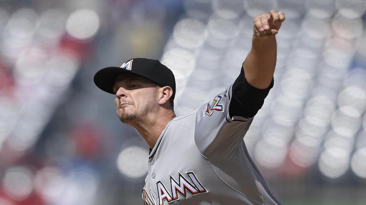 
Miami Marlins starting pitcher Justin Nicolino delivers a pitch against the Washington Nationals during the first inning of a baseball game, Sunday, Sept. 20, 2015, in Washington.
