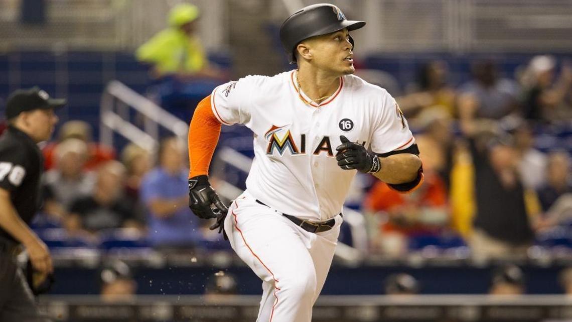 Miami Marlins outfielder Giancarlo Stanton hits a double in the bottom of the first inning as the Miami Marlins host the Arizona Diamondbacks at Marlins Park on Fri., June 2, 2017.