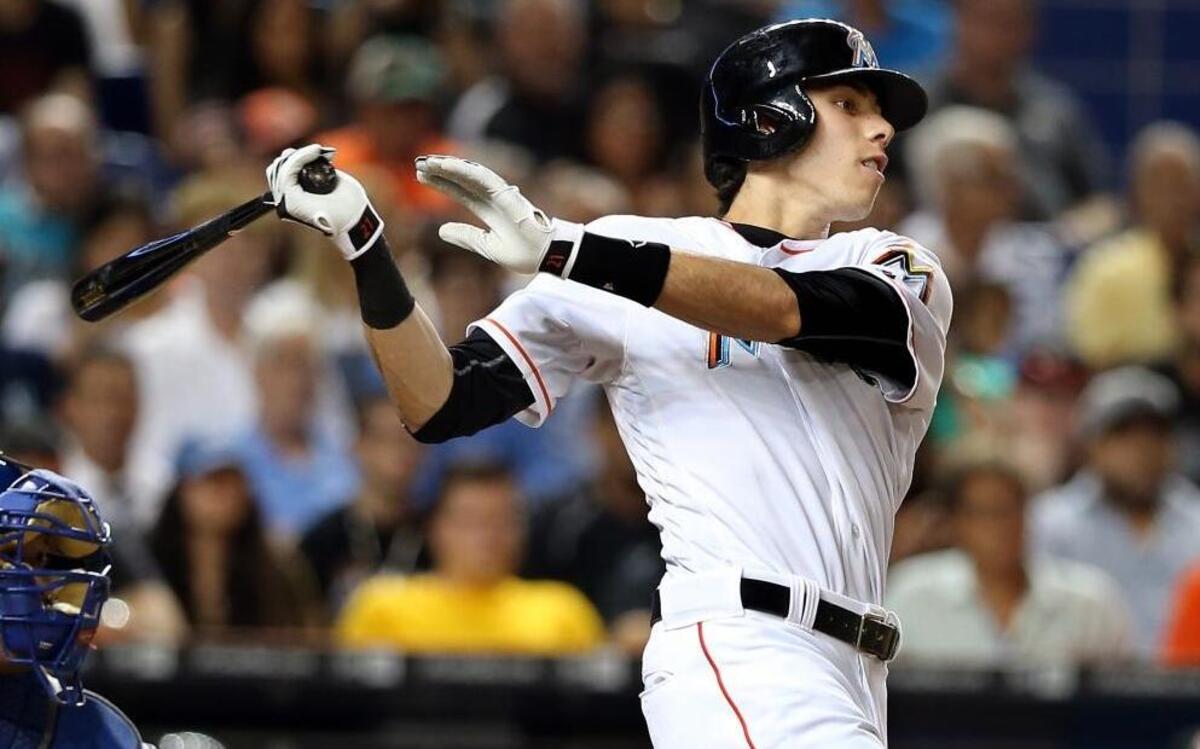 Miami Marlins' left fielder Christian Yelich hits a two runs RBI single in the sixth inning of the Miami Marlins vs Kansas City Royals, game at Marlins Park in Little Havana in Miami on Wed., Aug. 24, 2016.