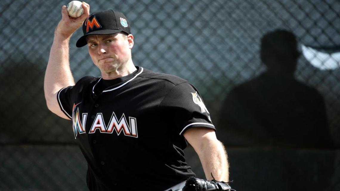 Miami Marlins pitcher Carter Capps throws a bullpen session during spring training baseball practice Monday, Feb. 22, 2016, in Jupiter, Fla.