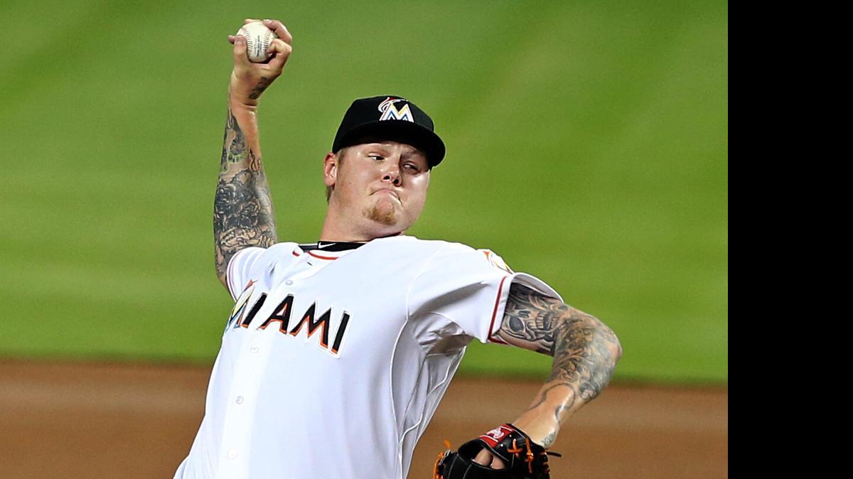 
Marlins starter Mat Latos pitches in the first inning against the Washington Nationals at Marlins Park on Friday, April 24, 2015.

