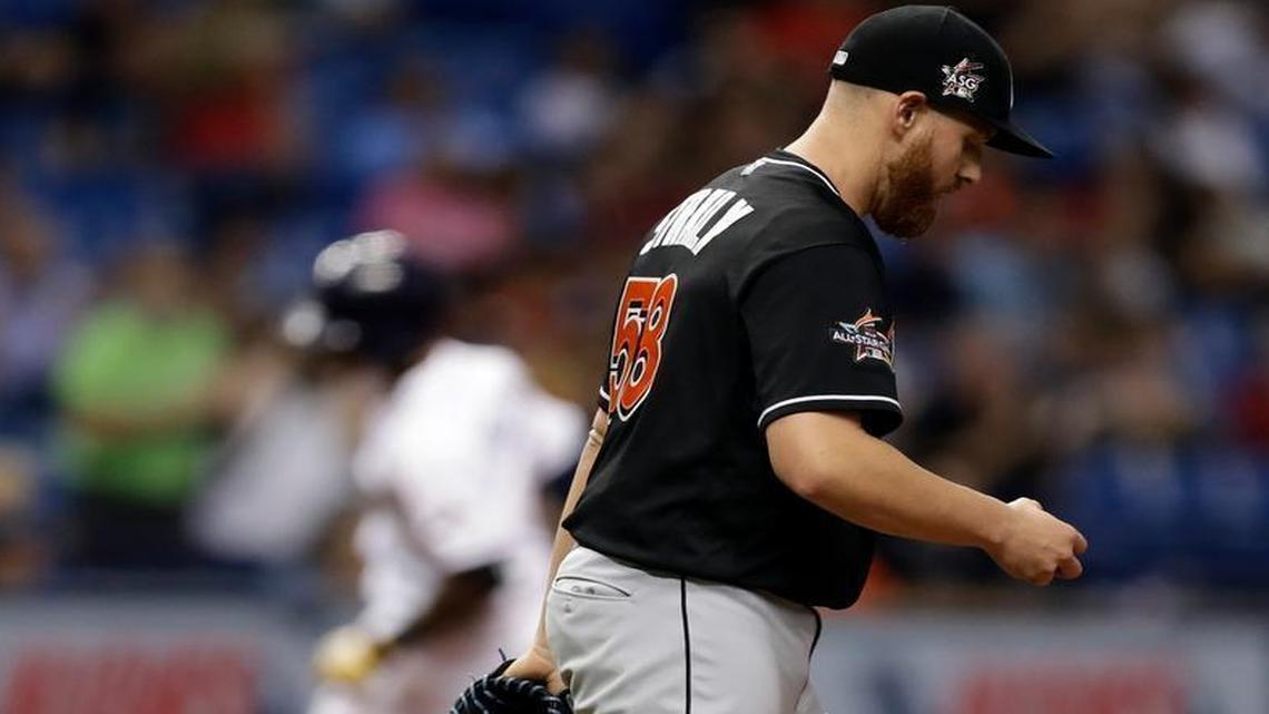 Miami Marlins pitcher Dan Straily walks back to the mound as Tampa Bay Rays' Tim Beckham runs around the bases after his two-run home run during the second inning of a baseball game Thurs., May 4, 2017, in St. Petersburg, Fla.