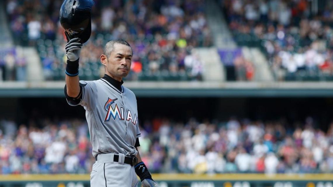 Ichiro Suzuki of the Miami Marlins acknowledges the crowd in Denver after he tripled in the seventh inning Sunday for his 3,000th career major-league hit.