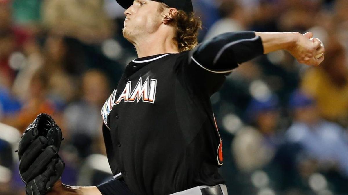 
Miami Marlins relief pitcher Adam Conley winds up in the seventh inning against the New York Mets in New York, Wednesday, Sept. 16, 2015.
