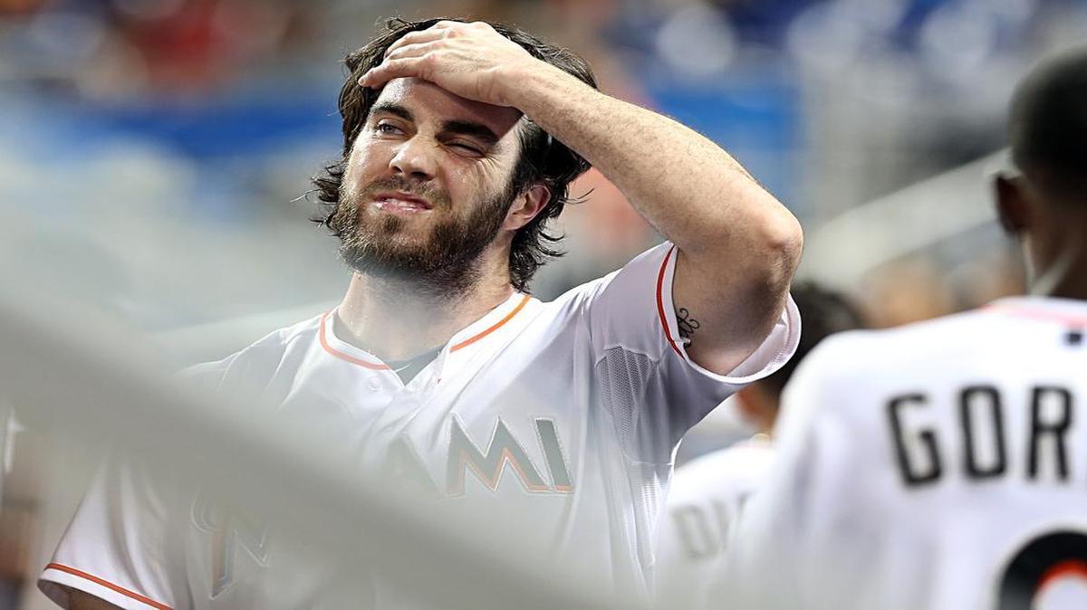 
Dan Haren, pitcher for the Miami Marlins, reacts at the end of the third inning of the game against the St. Louis Cardinalsat the Marlins Park in Miami on Thursday, June 25, 2015.
