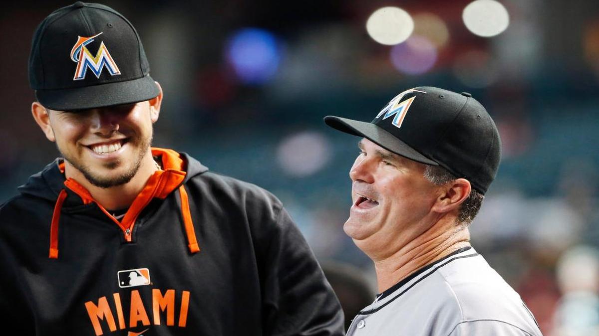 
Miami Marlins pitcher Jose Fernandez shares a laugh with manager Dan Jennings before a game against the Arizona Diamondbacks on Monday, July 20, 2015, in Phoenix. 
