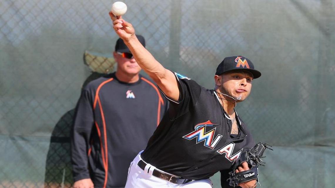 Miami Marlins pitcher A.J. Ramos throws during the spring training baseball workouts for pitchers and catchers at Roger Dean Stadium on Friday, February 19, 2016 in Jupiter.