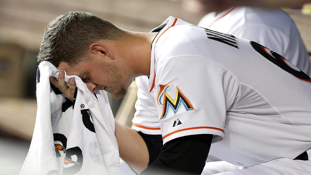 Pitcher Justin Nicolino, for the Miami Marlins reacts at the dugout in the second inning of the Miami Marlins vs Pittsburgh Pirates, game at the Marlins Park in Little Havana in Miami on Thursday, August 27, 2015.