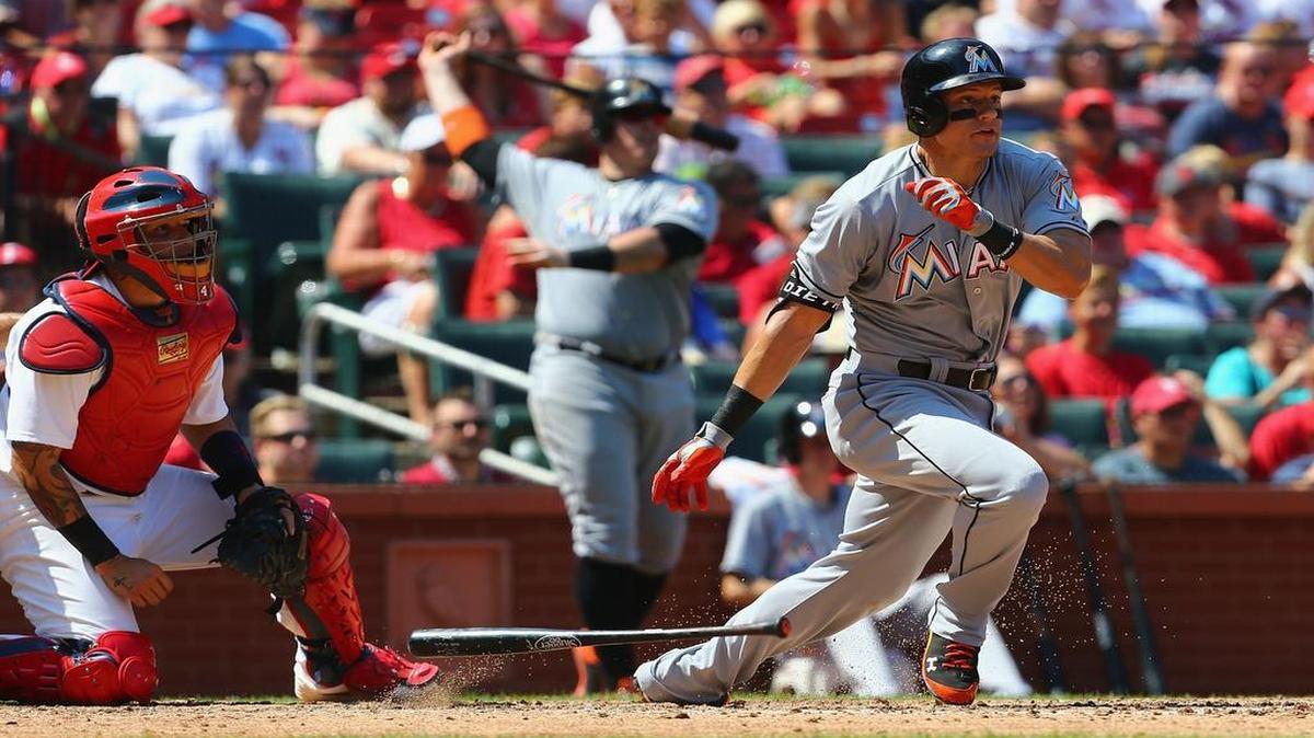 
Miami’s Derek Dietrich belts the go-ahead three-run triple against the Cardinals in the fifth inning of Sunday’s game.
