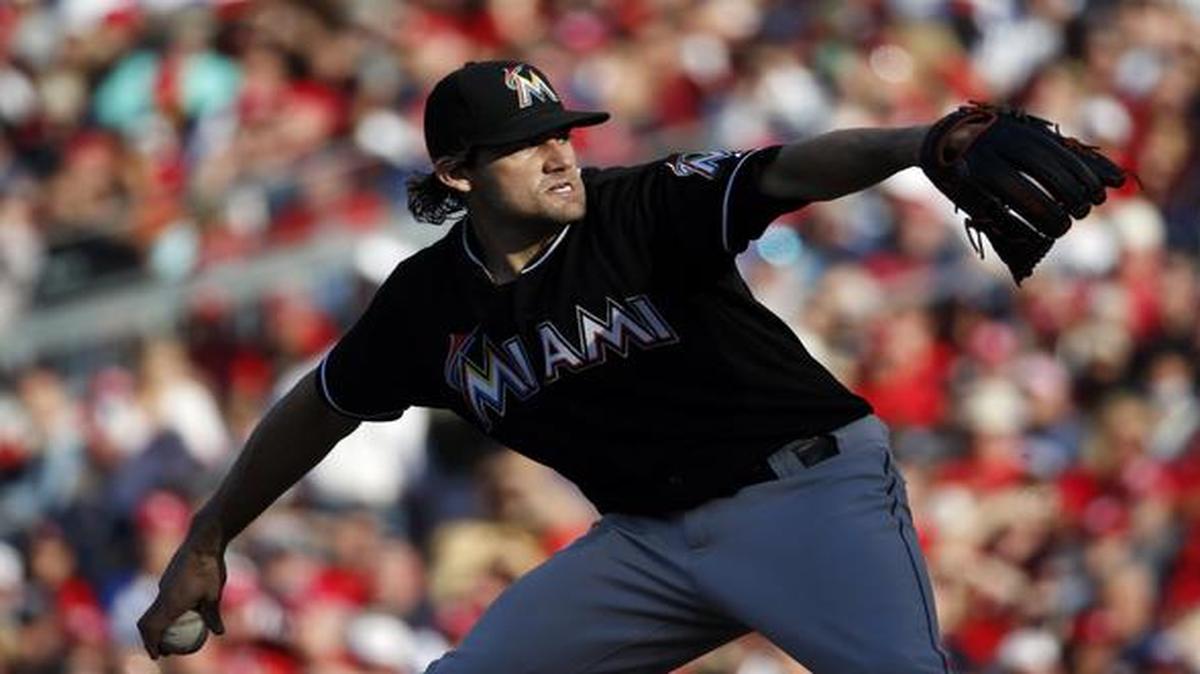 
Miami Marlins starting pitcher Nathan Eovaldi throws during the third inning of a baseball game against the Washington Nationals, Saturday, Sept. 27, 2014, in Washington. 
