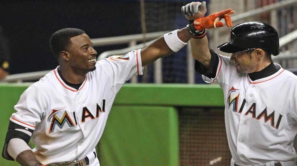 
Dee Gordon, second baseman of the Miami Marlins, celebrates his inside the park homer in the second inning against the San Francisco Giants on Tuesday, June 30, 2015 at Marlins Park in Miami.
