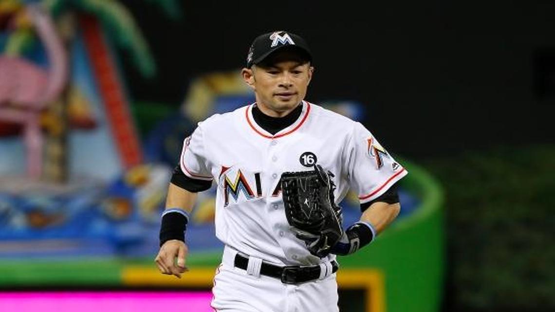 Miami Marlins left fielder Ichiro Suzuki returns to the dugout after end of the fourth inning of a baseball game against the New York Mets at Marlins Park on Thursday, June 29, 2017 in Miami.