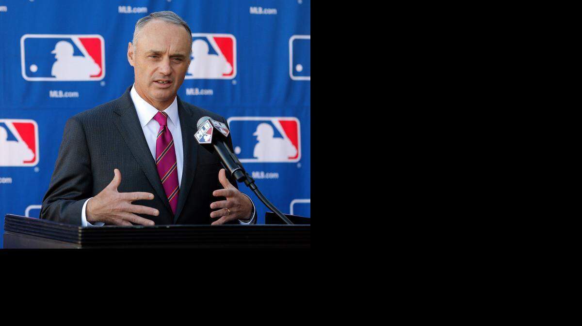 
FILE - In a Jan. 15, 2015 file photo then Commissioner-elect Rob Manfred speaks during a news conference at the Major League Baseball owners meeting in Phoenix. Monday morning, Jan. 26, 2015, was the first business day after Manfred succeeded Bud Selig and started a five-year term as commissioner.
